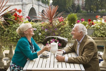 Couple drinking tea outdoors