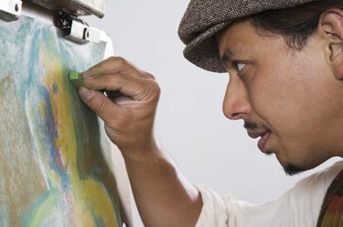 Man drawing with pastels