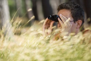 Man using binoculars