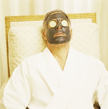 Man with spa mud mask