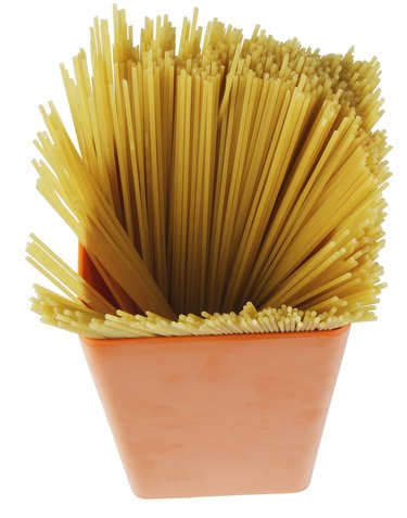 Container of uncooked spaghetti