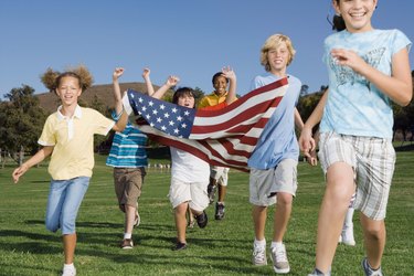 People running with American flag