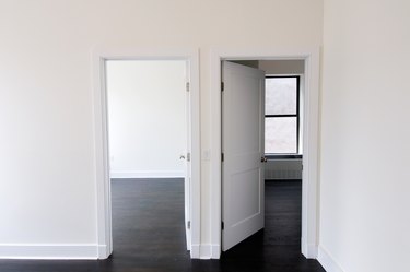 Open doors with empty rooms