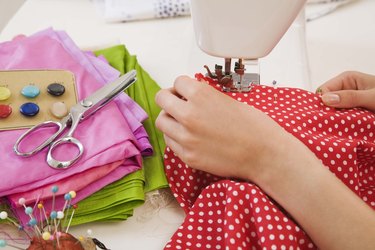 Woman using sewing machine