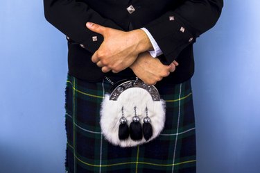 Close-up of man in kilt