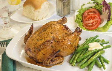 cornish game hen with fresh vegetables