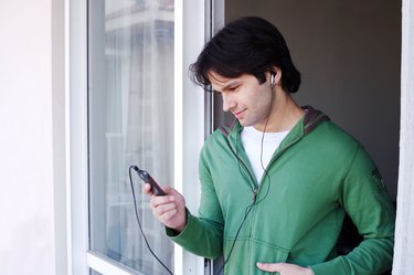 Close up of a man listening to music