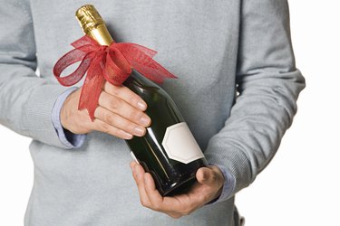 Man with champagne bottle