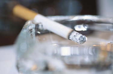 Cigarette in ashtray