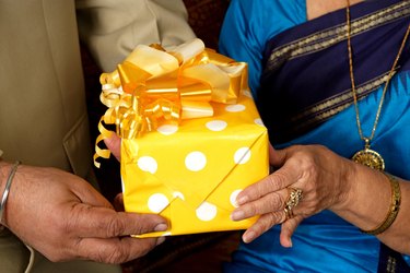 Senior couple sharing gifts