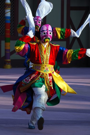 Dancer with pink mask