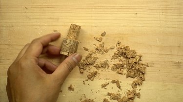 Preparing cork for DIY glass beaded garden sparkler.