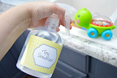 Cleaning baby toys with sanitizer