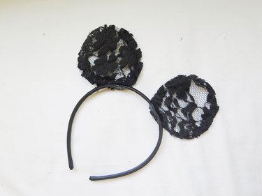 The mouse ears with the back layer of lace cut out.