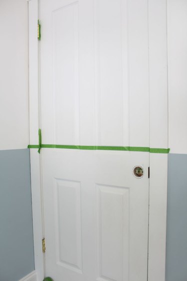 Tape the interior door with painter's tape.