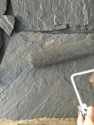 How to Update a Rock Fireplace By Using Paint