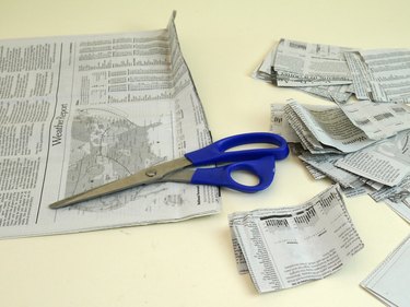 A newspaper cut up into strips.
