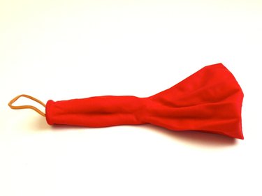 A red punch balloon turned inside out.