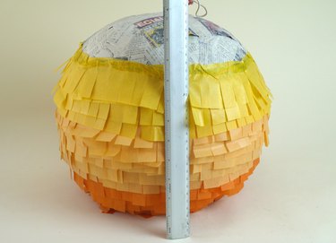 Three colors of fringe covering 3/4 of the balloon.