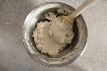 Mix until the dough resembles a coarse and combined mixture.