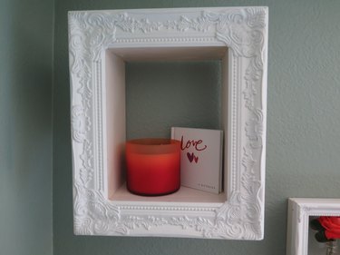 Display candles or books in your new shadow box.
