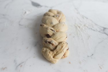 Tightly braid together the doug.