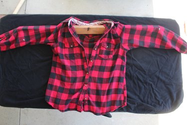 Wood placed inside the shirt.