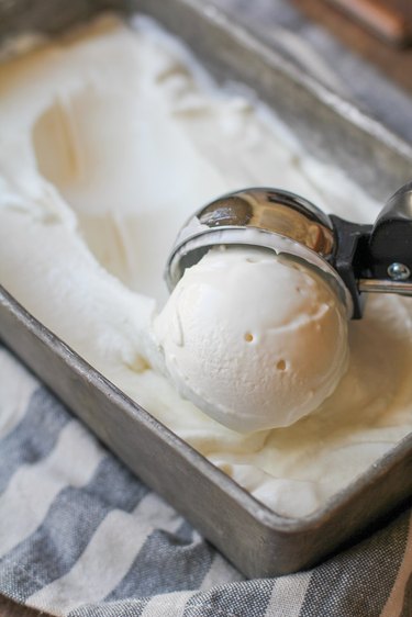 Ice cream being scooped out of a container