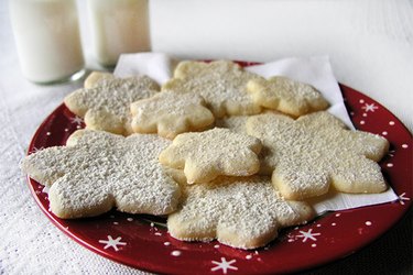 Snowflake shaped sugar cookies on a plate