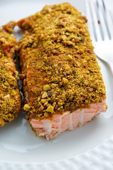 Baked pistachio-crusted salmon ready to be served.