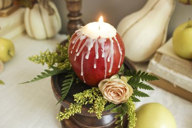 Apple candle with flowers