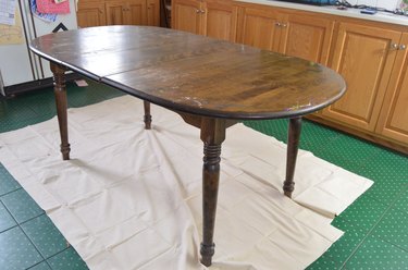 Cheap table with flaking finish