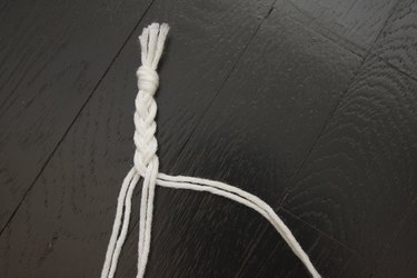 Braid the yarn holding it double stranded.