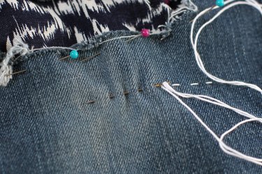 load the needle with multiple stitches again