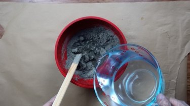 Mixing cement for DIY candles with cement base project