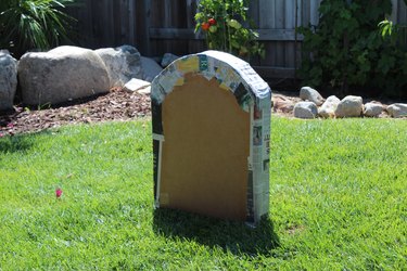 Top and sides of tombstone with paper machete.