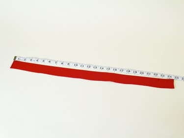 Vinyl waistband with a ruler showing 25 inches.
