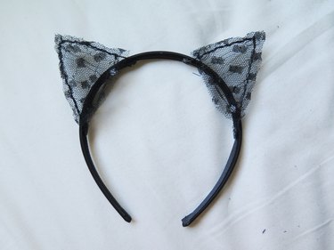 The lace cat ears attached to the headband.