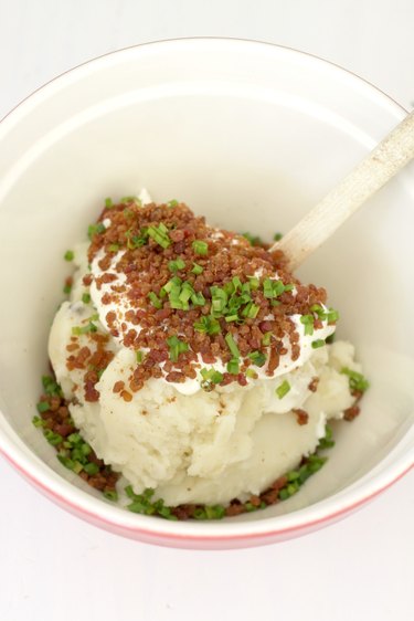 mix ingredients for mashed potato cheesy bites
