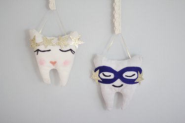 Two hanging tooth fairy pillows