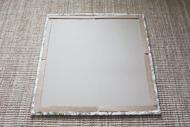 Add cardboard to the back of memo board