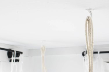 Install ceiling hooks where you want the canopy to hang