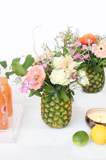 Make a pineapple into a flower vase