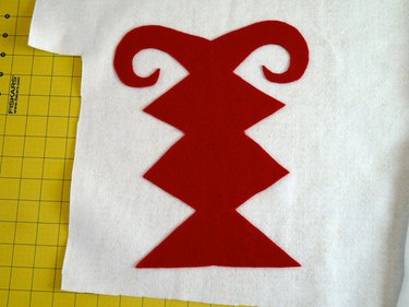 The red design on top of white felt.