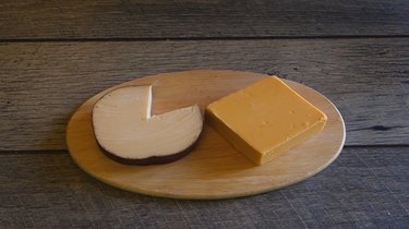 Smoked gouda and cheddar cheese to be frozen.