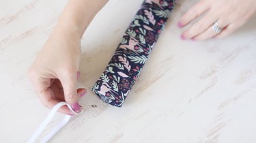 Threading elastic through fabric