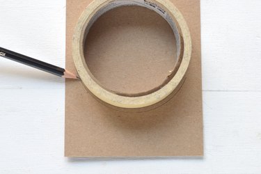 Trace the masking tape on scrap cardboard