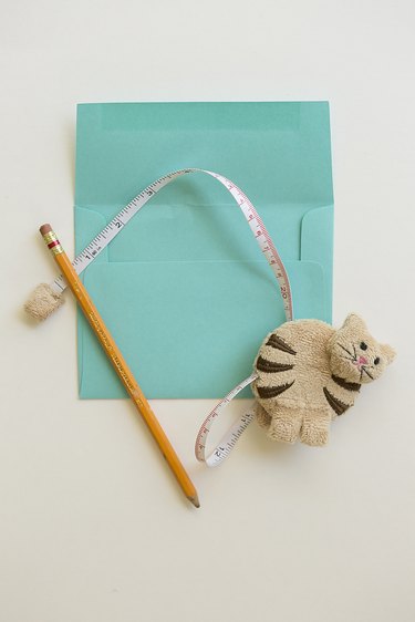 Envelope, pencil and ruler.
