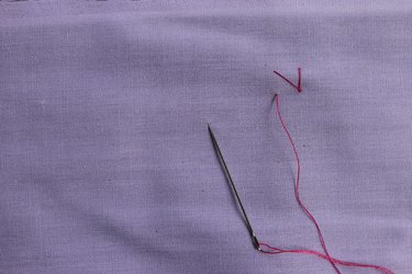 Inserting the needle just below the diagonal line for zig zag stitch