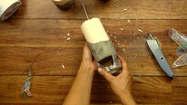 Removing DIY candles with cement base from mold.